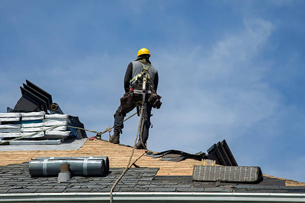 Professional Metal Roofing technician working in Grand Haven, MI